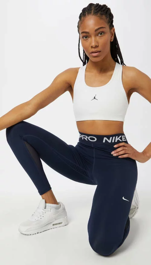 Modré dámské legíny na cvičení Nike pro